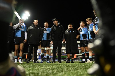 231026 - Cardiff Rugby v Hollywoodbets Sharks - United Rugby Championship - Cardiff head coach, Corniel Van Zyl leas his sides huddle at full time