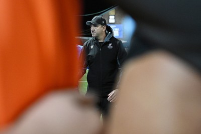 231026 - Cardiff Rugby v Hollywoodbets Sharks - United Rugby Championship - Cardiff head coach, Corniel Van Zyl leas his sides huddle at full time