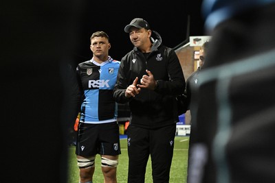 231026 - Cardiff Rugby v Hollywoodbets Sharks - United Rugby Championship - Cardiff head coach, Corniel Van Zyl leas his sides huddle at full time