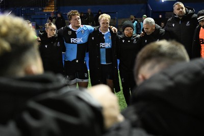 231026 - Cardiff Rugby v Hollywoodbets Sharks - United Rugby Championship - Cardiff head coach, Corniel Van Zyl leas his sides huddle at full time