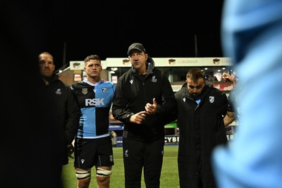 231026 - Cardiff Rugby v Hollywoodbets Sharks - United Rugby Championship - Cardiff head coach, Corniel Van Zyl leas his sides huddle at full time