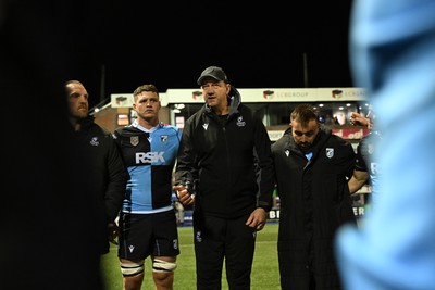 231026 - Cardiff Rugby v Hollywoodbets Sharks - United Rugby Championship - Cardiff head coach, Corniel Van Zyl leas his sides huddle at full time