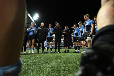 231026 - Cardiff Rugby v Hollywoodbets Sharks - United Rugby Championship - Cardiff head coach, Corniel Van Zyl leas his sides huddle at full time
