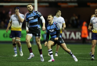270226 - Cardiff v Leinster - United Rugby Championship - Ioan Lloyd and Cameron Winnett of Cardiff celebrate at full time