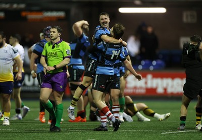 270226 - Cardiff v Leinster - United Rugby Championship - Jacob Beetham and Harri Millard of Cardiff celebrate at full time