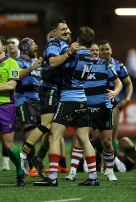 270226 - Cardiff v Leinster - United Rugby Championship - Jacob Beetham and Harri Millard of Cardiff celebrate at full time