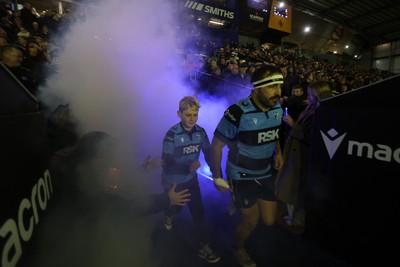 270226 - Cardiff v Leinster - United Rugby Championship - Liam Belcher of Cardiff with mascot