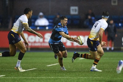 270226 - Cardiff Rugby v Leinster - United Rugby Championship - Harri Millard of Cardiff Rugby is challenged by Joshua Kenny of Leinster