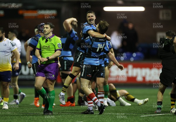 270226 - Cardiff v Leinster - United Rugby Championship - Jacob Beetham and Harri Millard of Cardiff celebrate at full time