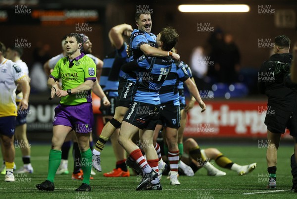 270226 - Cardiff v Leinster - United Rugby Championship - Jacob Beetham and Harri Millard of Cardiff celebrate at full time
