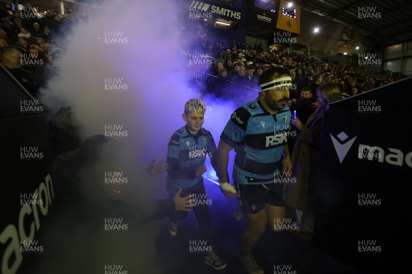 270226 - Cardiff v Leinster - United Rugby Championship - Liam Belcher of Cardiff with mascot
