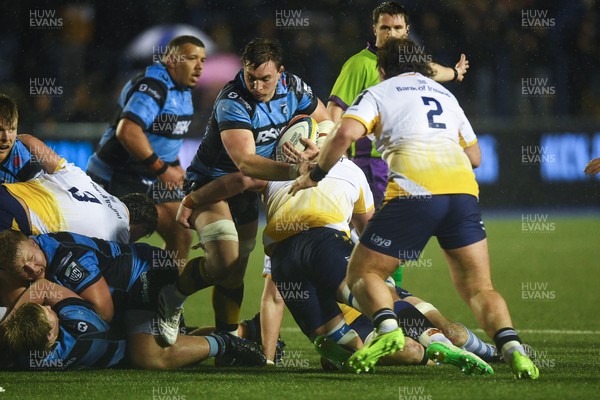 270226 - Cardiff Rugby v Leinster - United Rugby Championship - Taine Basham of Cardiff Rugby is challenged by John McKee of Leinster