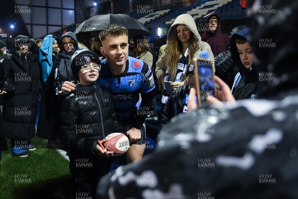 270226 - Cardiff Rugby v Leinster - United Rugby Championship - Cam Winnett of Cardiff Rugby with fans at full time
