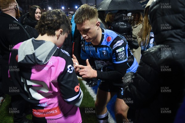 270226 - Cardiff Rugby v Leinster - United Rugby Championship - Cam Winnett of Cardiff Rugby with fans at full time