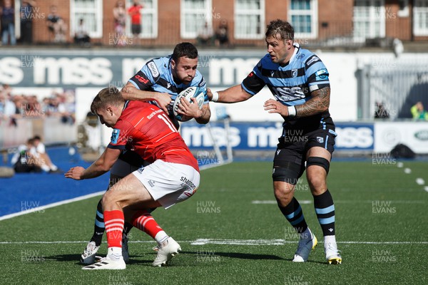 170922 - Cardiff Rugby v Munster - United Rugby Championship - Aled Summerhill of Cardiff Rugby is tackled by Liam Coombes of Munster