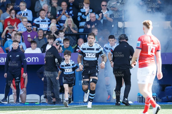 170922 - Cardiff Rugby v Munster - United Rugby Championship - Josh Turnbull of Cardiff Rugby leads the Cardiff Rugby team onto the pitch
