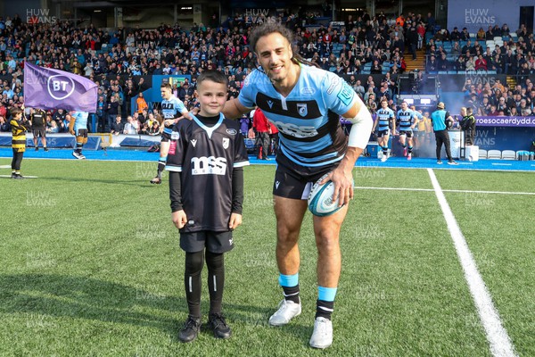 230422 - Cardiff Rugby v Ospreys - United Rugby Championship - Mascot with Josh Navidi of Cardiff Rugby 