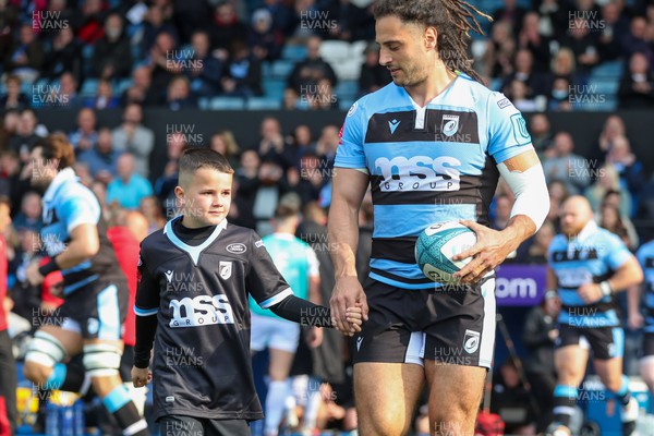 230422 - Cardiff Rugby v Ospreys - United Rugby Championship - Mascot with Josh Navidi of Cardiff Rugby 
