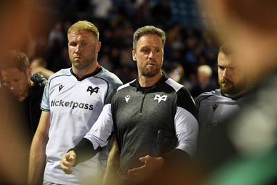 240426 - Cardiff Rugby v Ospreys - United Rugby Championship - Ospreys head coach, Mark Jones leads his sides huddle at full time