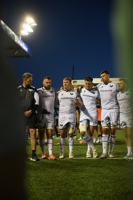 240426 - Cardiff Rugby v Ospreys - United Rugby Championship - Jac Morgan of Ospreys leads his sides huddle at full time