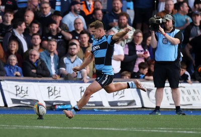 240426 - Cardiff Rugby v Ospreys - United Rugby Championship - Callum Sheedy of Cardiff Rugby kicks the conversion