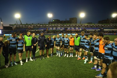 240426 - Cardiff Rugby v Ospreys - United Rugby Championship - Cardiff team huddle at full time