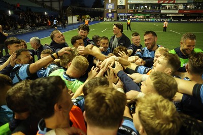 240426 - Cardiff Rugby v Ospreys - United Rugby Championship - Cardiff team huddle at full time