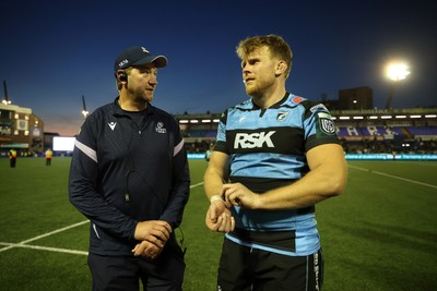 240426 - Cardiff Rugby v Ospreys - United Rugby Championship - Cardiff head coach, Corniel Van Zyl and Josh McNally of Cardiff Rugby at full time