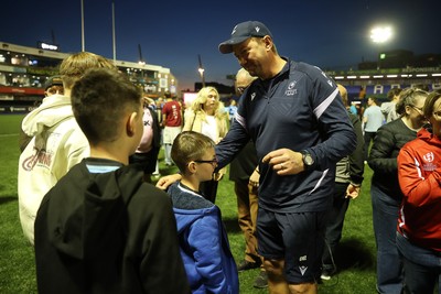 240426 - Cardiff Rugby v Ospreys - United Rugby Championship - Cardiff head coach, Corniel Van Zyl with fans at full time