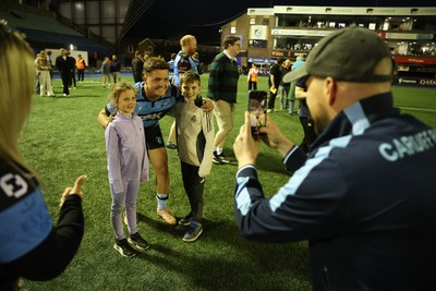 240426 - Cardiff Rugby v Ospreys - United Rugby Championship - Callum Sheedy of Cardiff Rugby with fans at full time