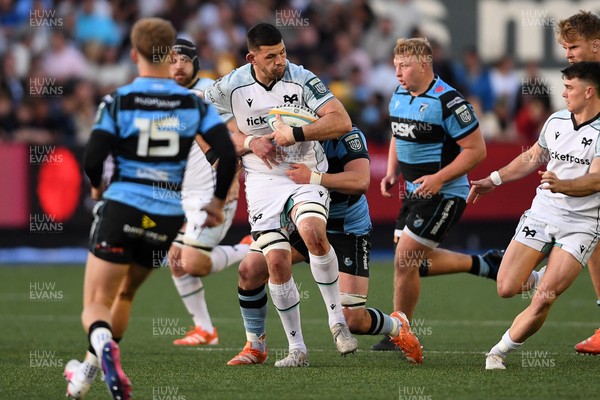240426 - Cardiff Rugby v Ospreys - United Rugby Championship - Rhys Davies of Ospreys is challenged by Alun Lawrence of Cardiff Rugby