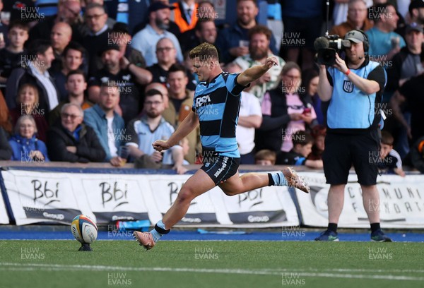 240426 - Cardiff Rugby v Ospreys - United Rugby Championship - Callum Sheedy of Cardiff Rugby kicks the conversion