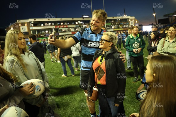 240426 - Cardiff Rugby v Ospreys - United Rugby Championship - Josh McNally of Cardiff Rugby with fans at full time