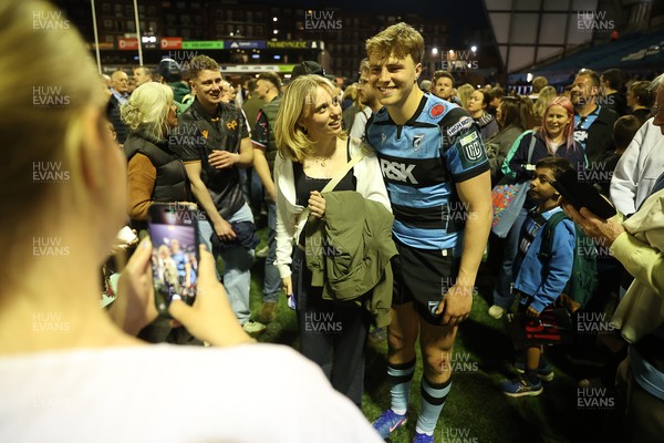 240426 - Cardiff Rugby v Ospreys - United Rugby Championship - Jacob Beetham of Cardiff Rugby with fans at full time