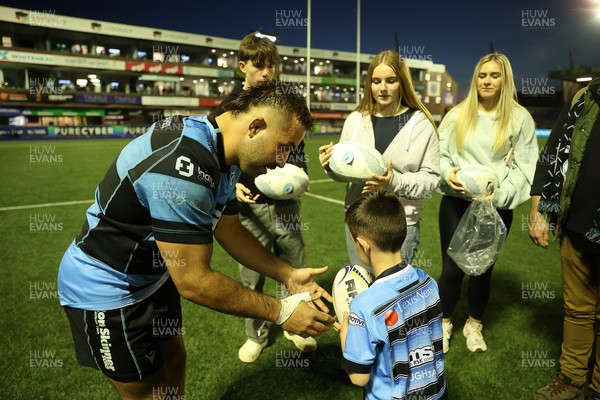 240426 - Cardiff Rugby v Ospreys - United Rugby Championship - Liam Belcher of Cardiff Rugby with fans at full time