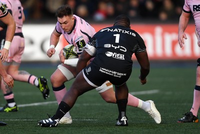 100126 - Cardiff Rugby v Racing 92 - EPCR Challenge Cup - Taine Basham of Cardiff Rugby is challenged by Edouard-Junior Jabea Njocke of Racing 92