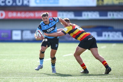 060925 - Cardiff Rugby v Richmond - Preseason Friendly - Harri Millard of Cardiff is tackled by Ronnie Du Randt of Richmond