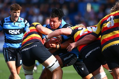 060925 - Cardiff Rugby v Richmond - Preseason Friendly - Javan Sebastian of Cardiff is wrapped up by the Richmond defenders