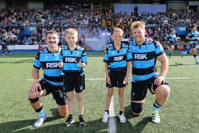 060925 - Cardiff Rugby v Richmond - Preseason Friendly - Harri Millard (L) and Josh McNally (R) of Cardiff with the match day mascots