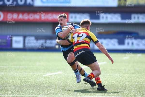 060925 - Cardiff Rugby v Richmond - Preseason Friendly - Harri Millard of Cardiff is tackled by Ronnie Du Randt of Richmond