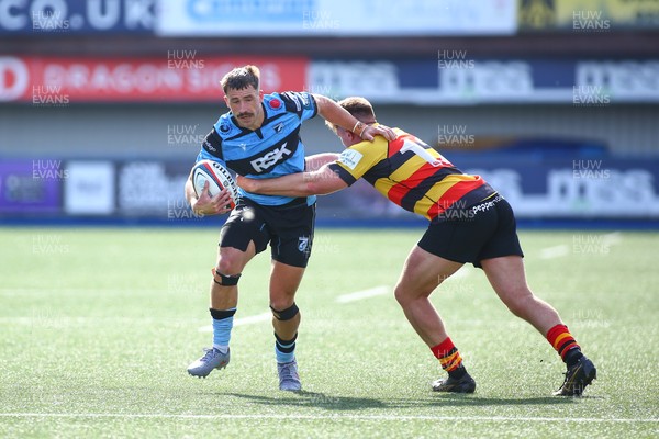 060925 - Cardiff Rugby v Richmond - Preseason Friendly - Harri Millard of Cardiff is tackled by Ronnie Du Randt of Richmond