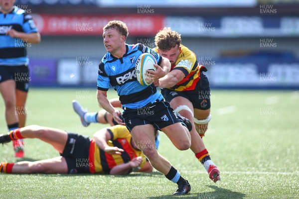 060925 - Cardiff Rugby v Richmond - Preseason Friendly - Tom Bowen of Cardiff takes on Jared Cardew of Richmond