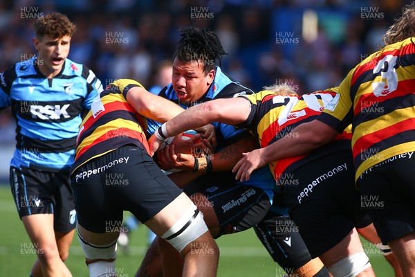 060925 - Cardiff Rugby v Richmond - Preseason Friendly - Javan Sebastian of Cardiff is wrapped up by the Richmond defenders