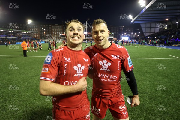 021223 - Cardiff Rugby v Scarlets - United Rugby Championship - Ioan Lloyd and Gareth Davies of Scarlets at full time