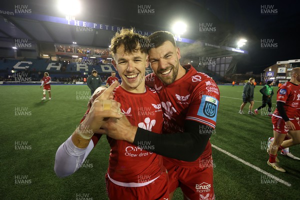 021223 - Cardiff Rugby v Scarlets - United Rugby Championship - Tom Rogers and Johnny Williams of Scarlets celebrate at full time