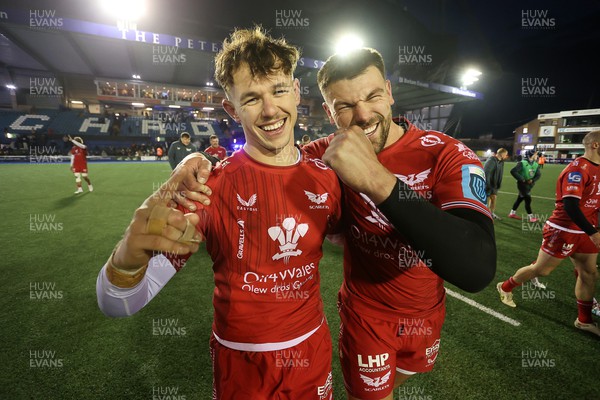 021223 - Cardiff Rugby v Scarlets - United Rugby Championship - Tom Rogers and Johnny Williams of Scarlets celebrate at full time