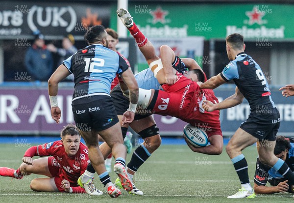 021223 - Cardiff Rugby v Scarlets - United Rugby Championship - Dan Davis of Scarlets is tackled by Ellis Jenkins of Cardiff which leads to a red card