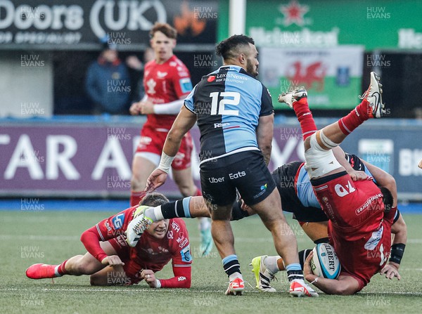 021223 - Cardiff Rugby v Scarlets - United Rugby Championship - Dan Davis of Scarlets is tackled by Ellis Jenkins of Cardiff which leads to a red card