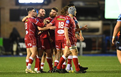 070123 - Cardiff v Scarlets - United Rugby Championship - Scarlets players celebrate