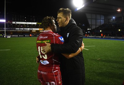 070123 - Cardiff v Scarlets - United Rugby Championship - Leigh Halfpenny and Liam Williams of Cardiff at the end of the game